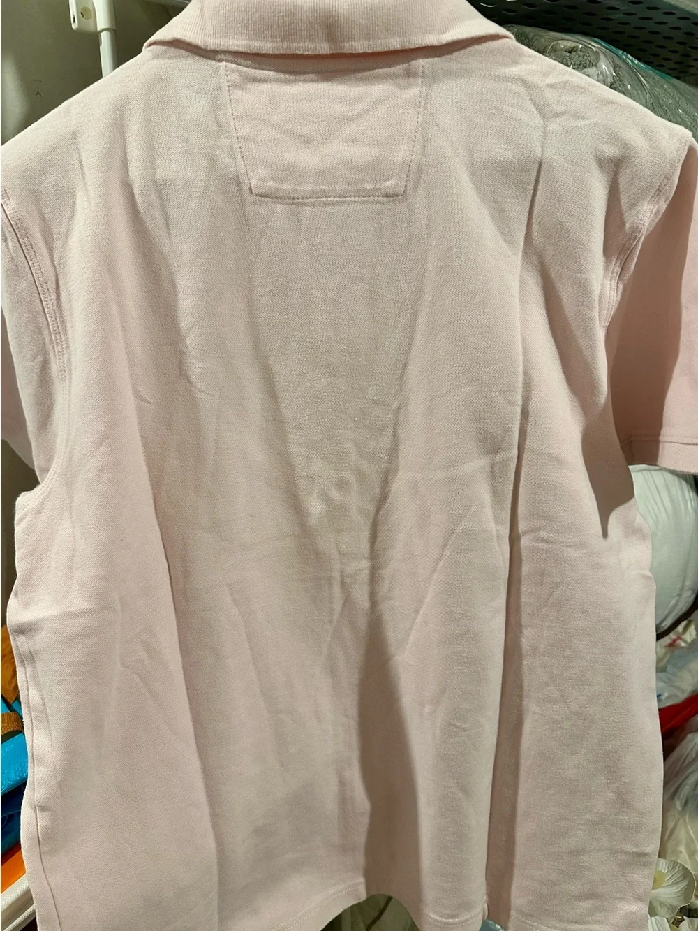 Banana Republic men’s polo in light pink, with gray elephant logo, size L